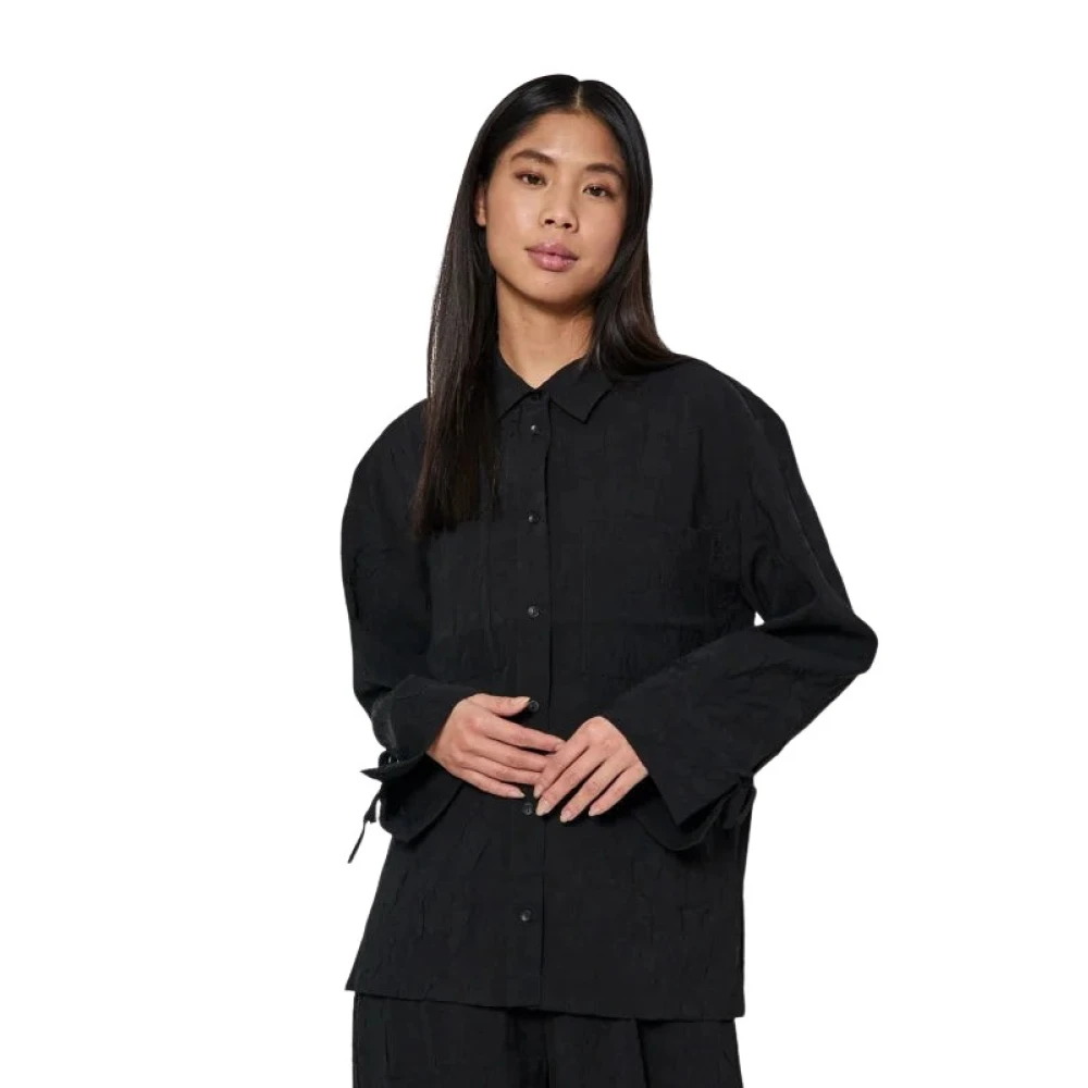 Norr Zwarte lange blouse met strikdetails Black Dames