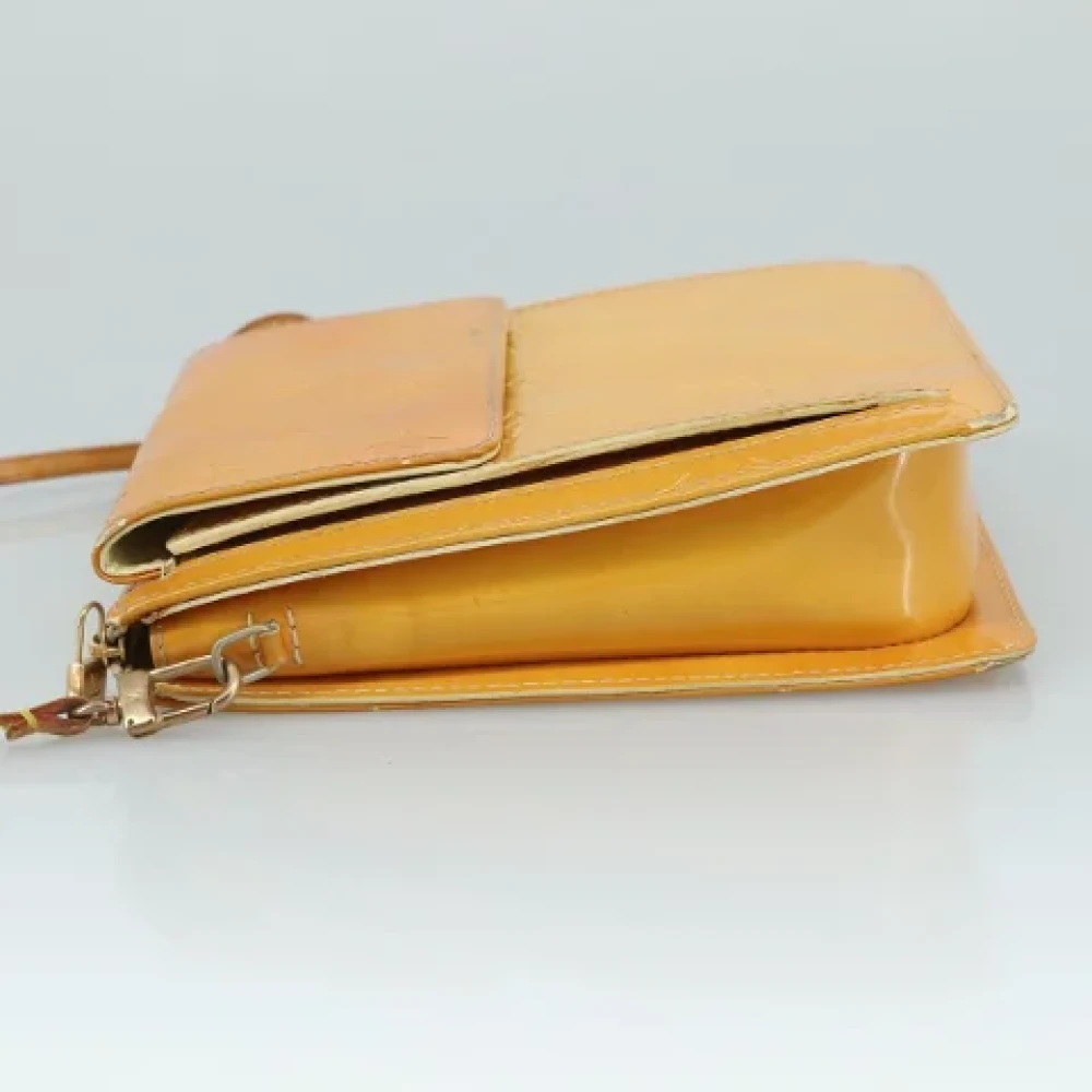 Louis Vuitton Vintage Pre-owned Leather pouches Yellow Dames
