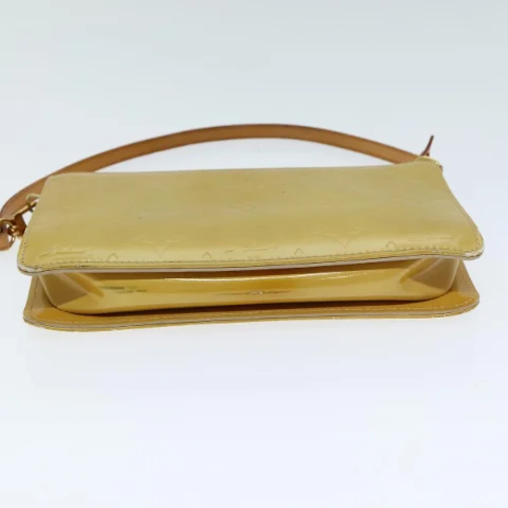 Louis Vuitton Vintage Pre-owned Leather pouches Beige Dames