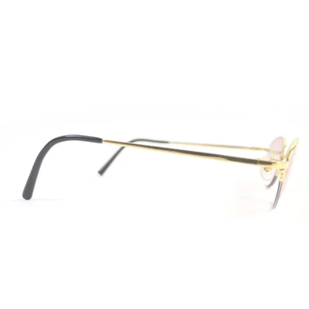 Chanel Vintage Pre-owned Metal sunglasses Yellow Dames