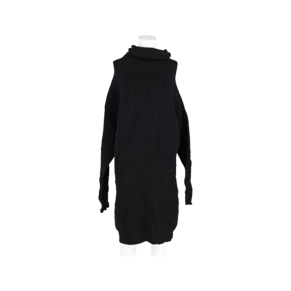 Acne Studios Pre-owned Wool dresses Black Dames