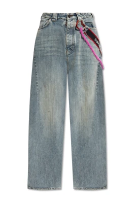 Jeans med dekorativa applikationer