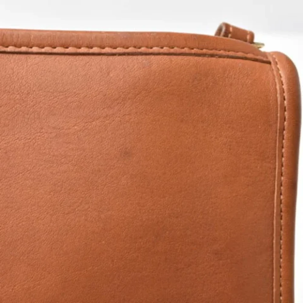 Coach Pre-owned Leather clutches Brown Dames