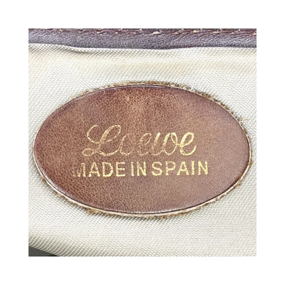Loewe Pre-owned Canvas clutches Brown Dames
