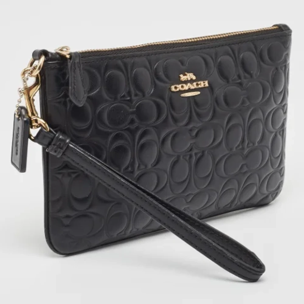 Coach Pre-owned Leather clutches Black Dames