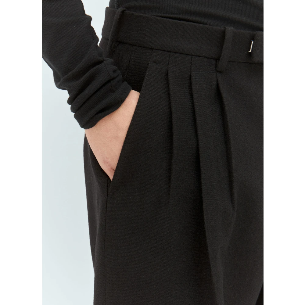 Burberry Wijde wollen broek met voorplooien Black Heren
