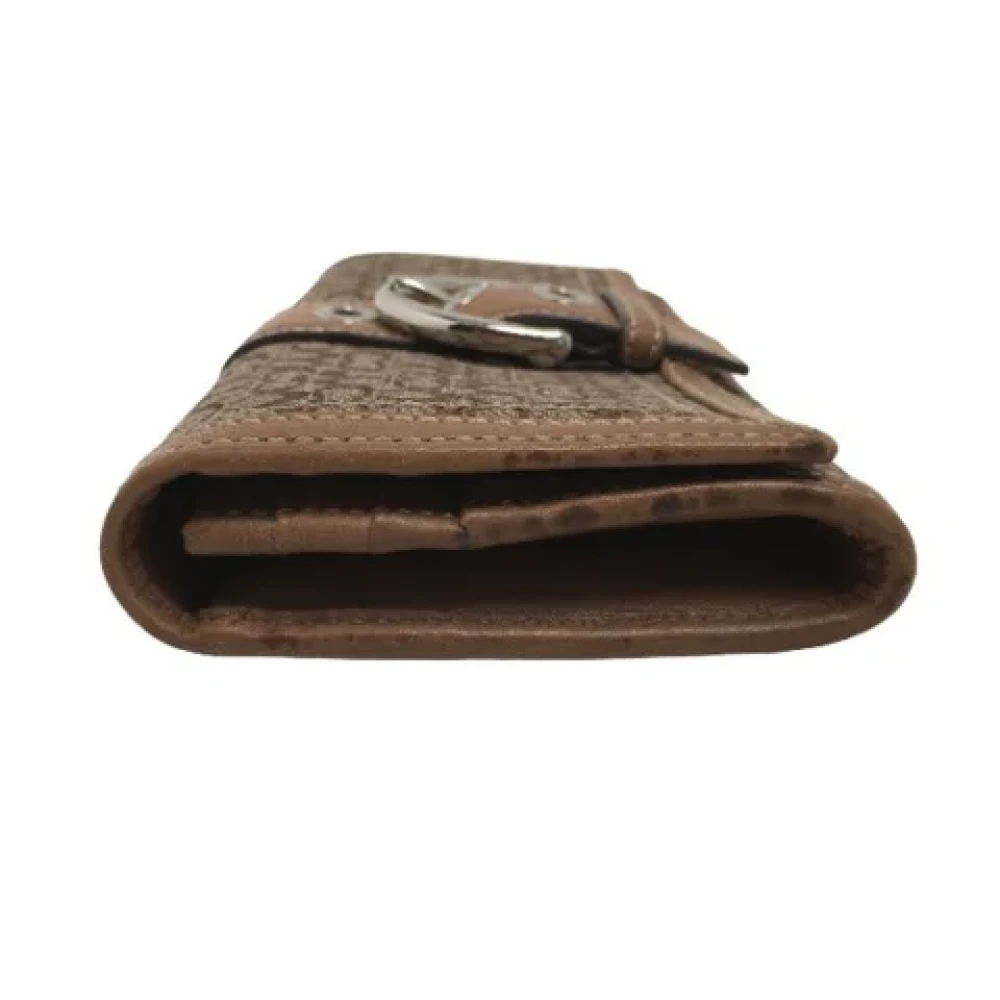 Coach Pre-owned Fabric clutches Brown Dames