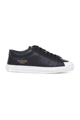 black-leather-sneakers-with-stud-details