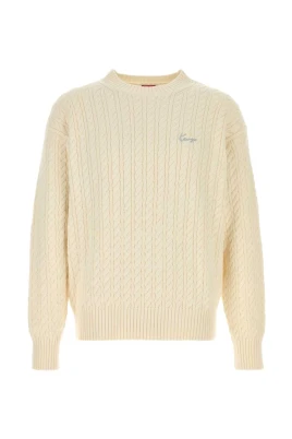 Sweater med kabelstickning och polokrage