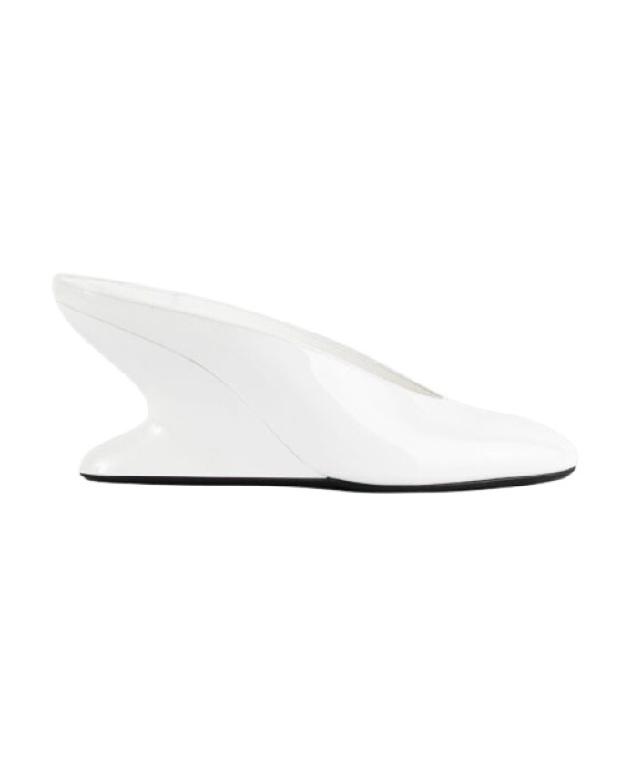 mules-blanches-sculpturales-a-talon-compense
