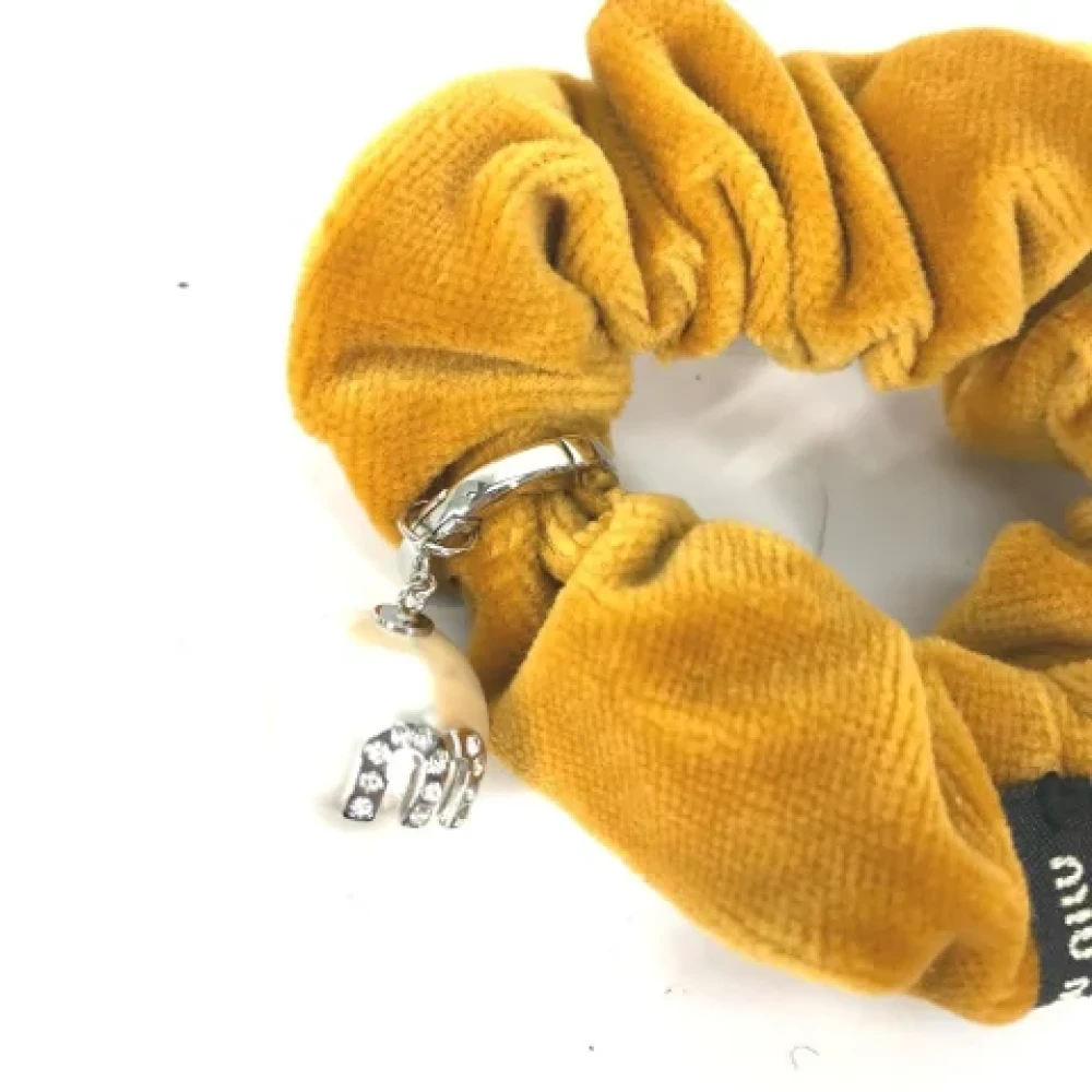 Miu Pre-owned Velvet hair-accessories Yellow Dames