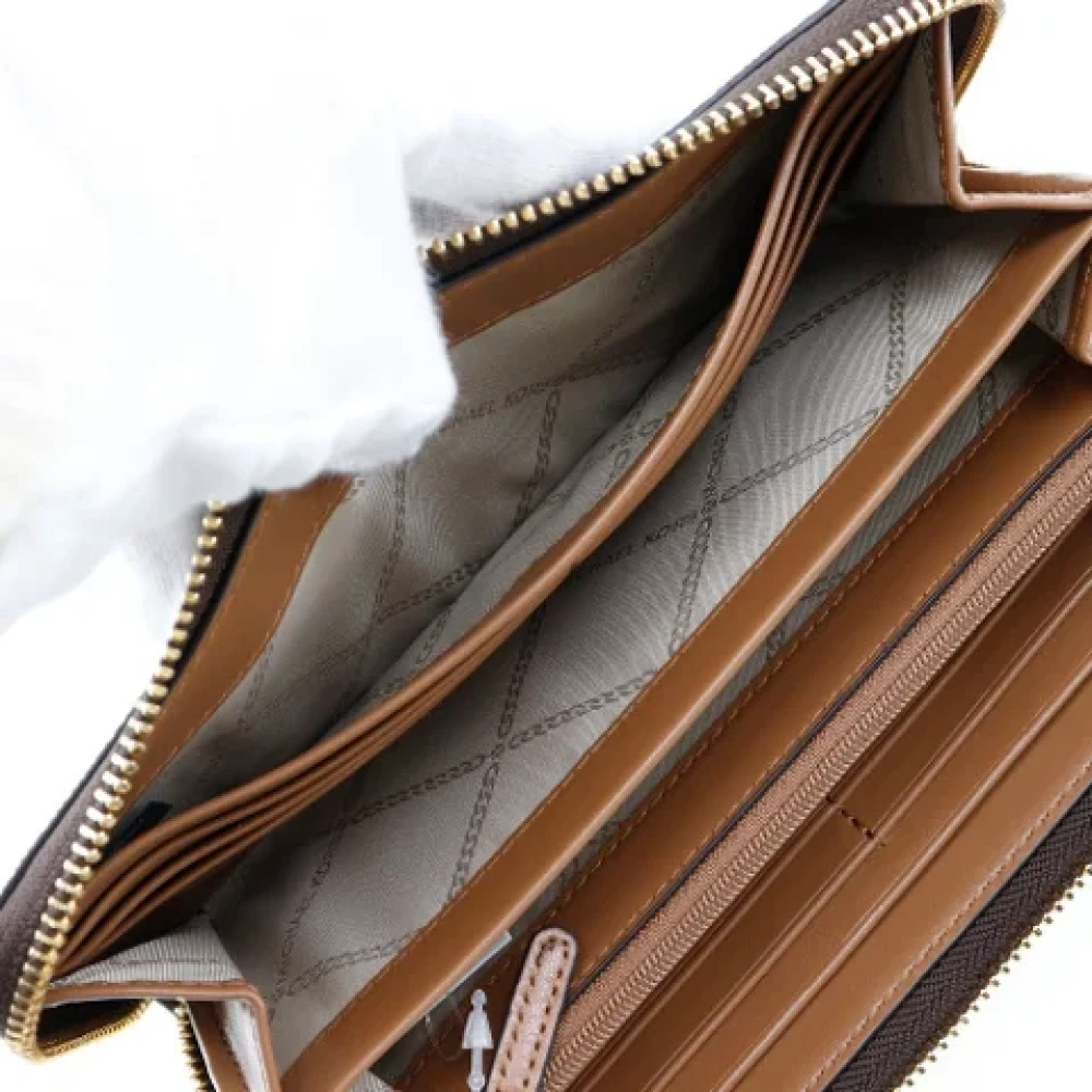 Michael Kors Pre-owned Leather wallets Brown Dames