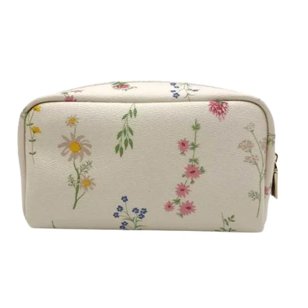 Coach Pre-owned Canvas clutches White Dames