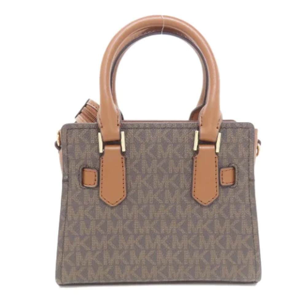 Michael Kors Pre-owned Plastic handbags Brown Dames