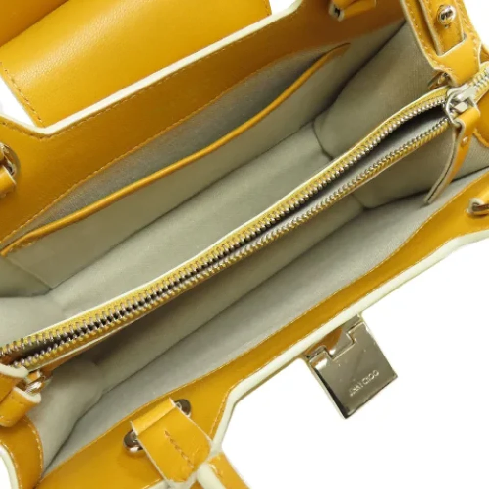 Jimmy Choo Pre-owned Suede handbags Yellow Dames