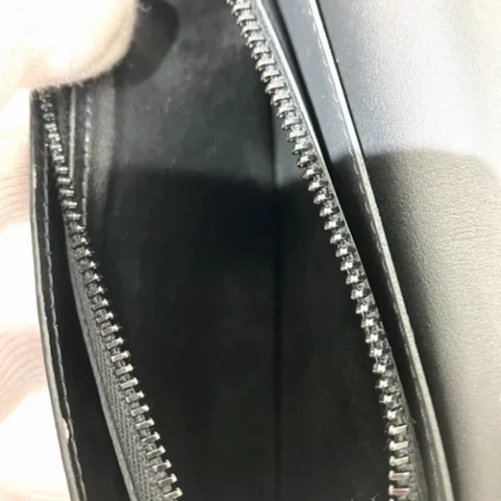 Louis Vuitton Vintage Pre-owned Leather wallets Black Heren