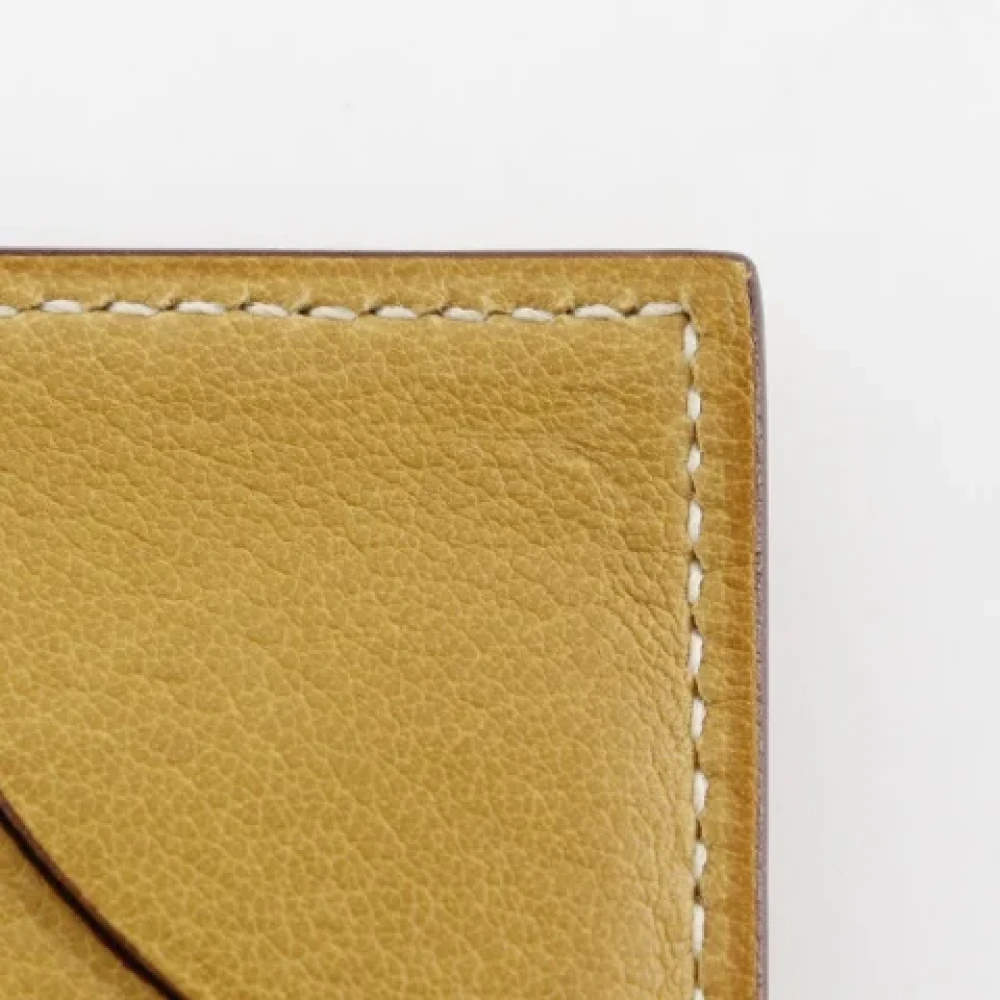 Hermès Vintage Pre-owned Leather wallets Yellow Dames