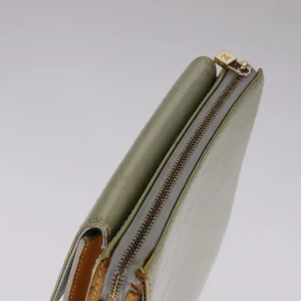 Louis Vuitton Vintage Pre-owned Leather pouches Beige Dames