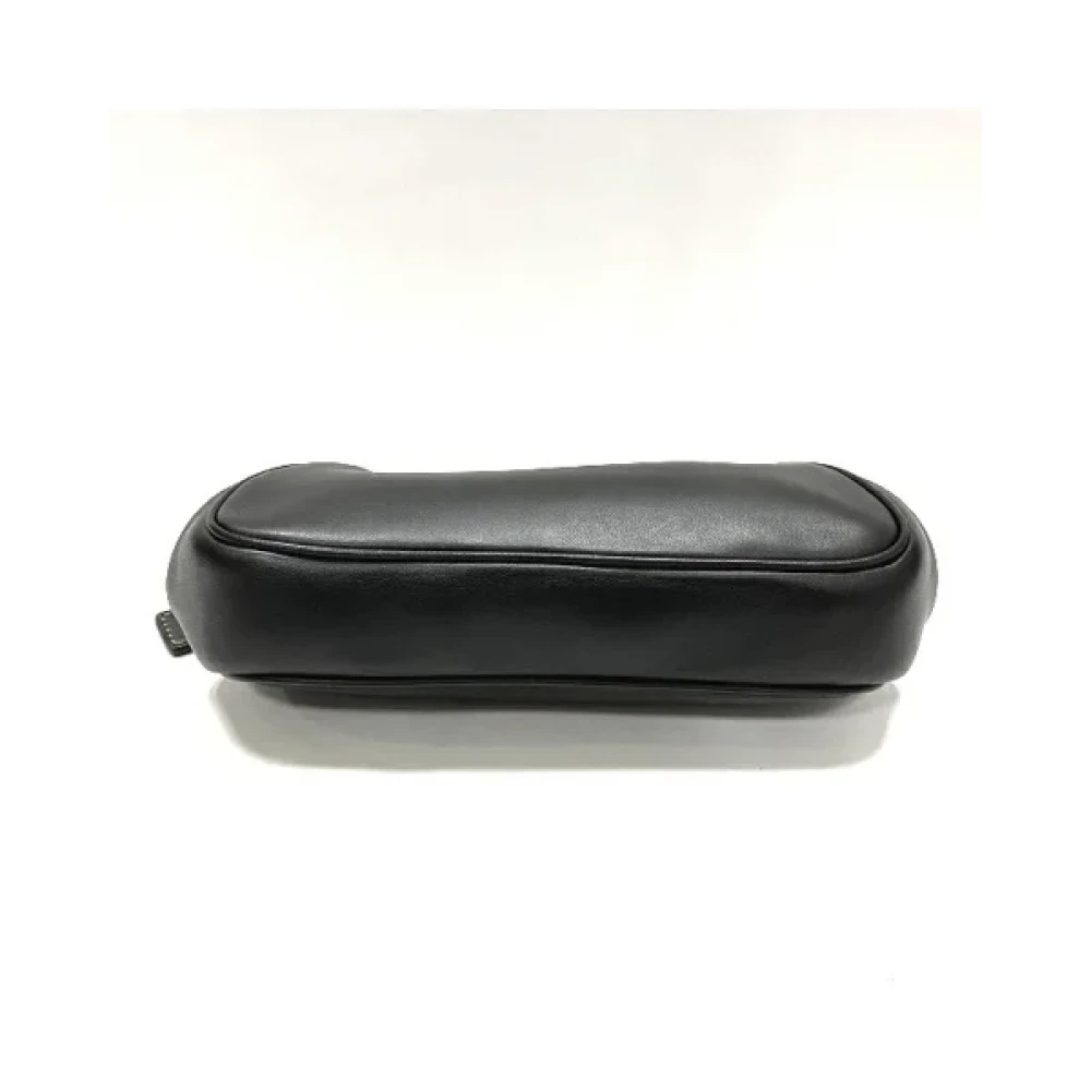 Coach Pre-owned Leather pouches Black Dames
