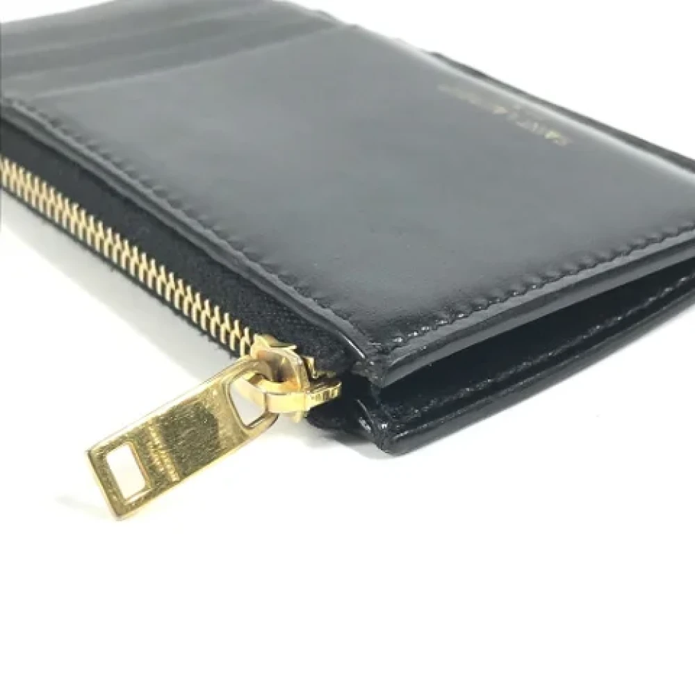 Yves Saint Laurent Vintage Pre-owned Leather wallets Black Heren