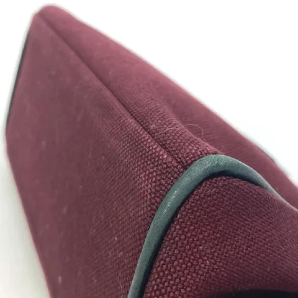 Hermès Vintage Pre-owned Fabric clutches Red Dames