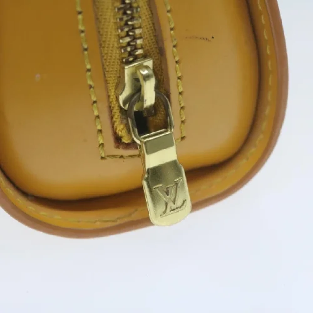 Louis Vuitton Vintage Pre-owned Leather pouches Yellow Dames