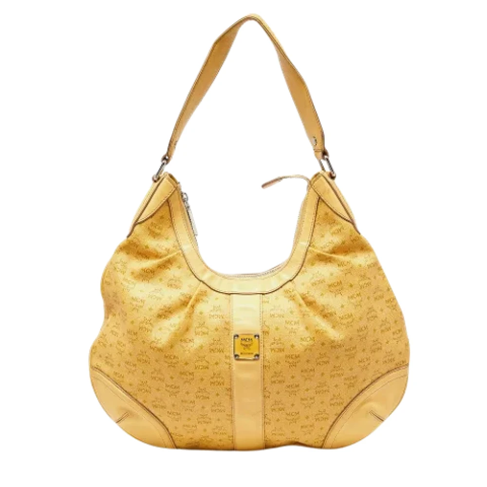 MCM Pre-owned Coated canvas handbags Yellow Dames