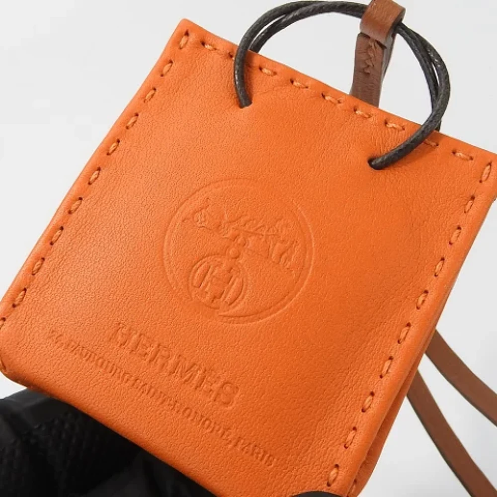 Hermès Vintage Pre-owned Leather key-holders Orange Dames