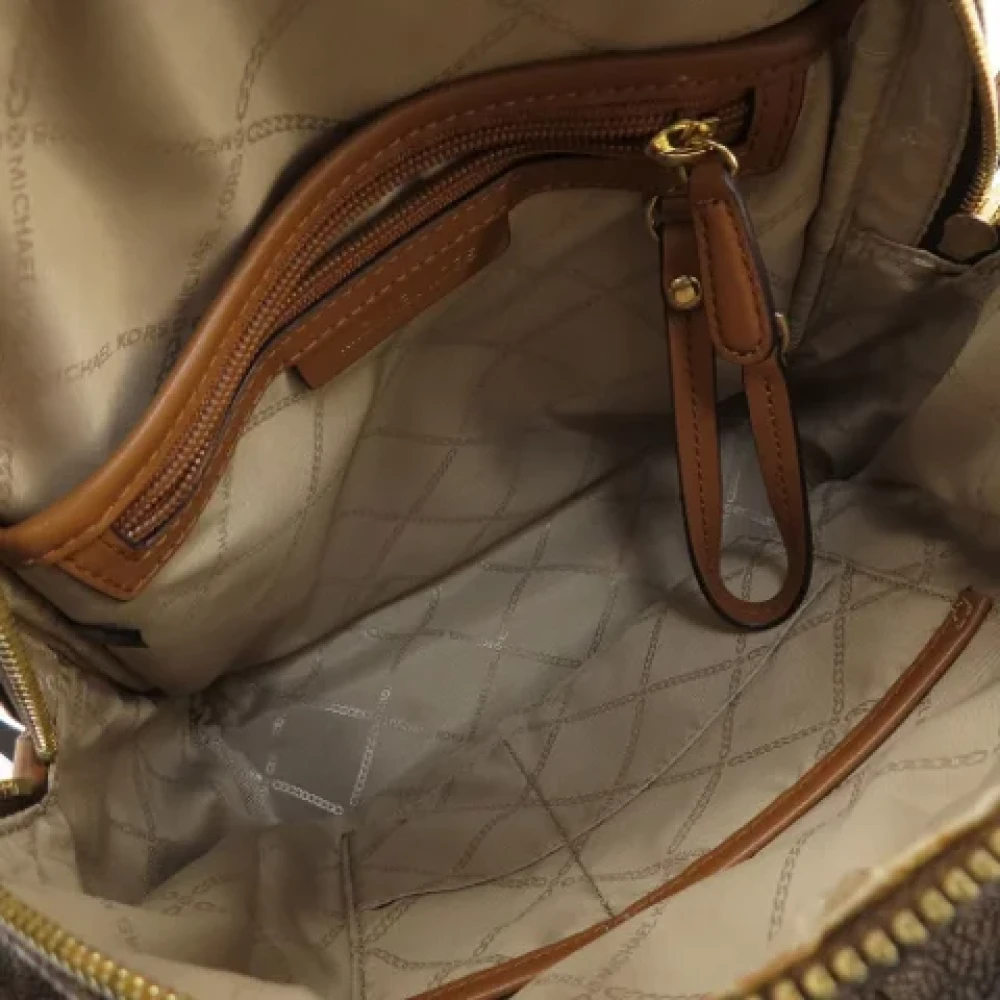 Michael Kors Pre-owned Canvas backpacks Brown Dames