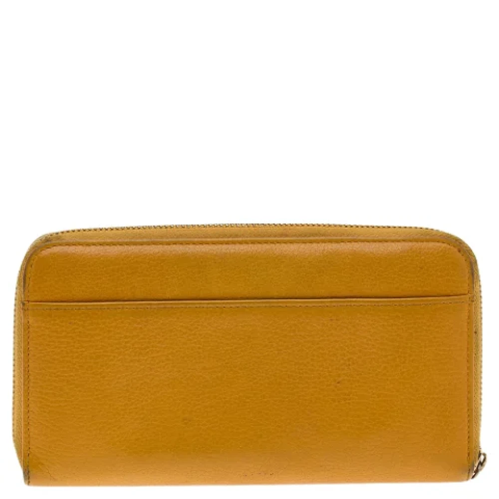 Dolce & Gabbana Pre-owned Leather wallets Yellow Dames