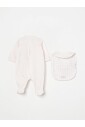 combi-pilote-beige-et-bavoir-ensemble