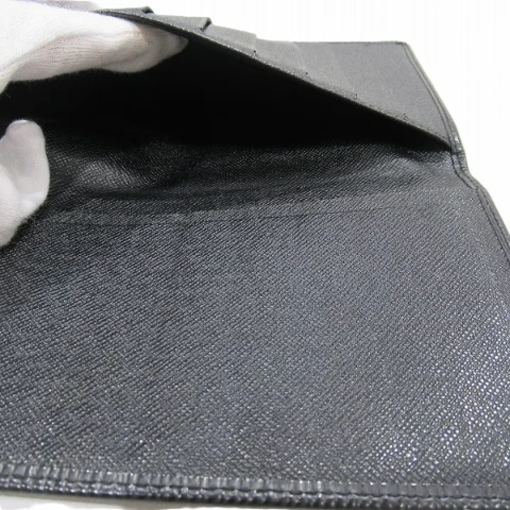 Louis Vuitton Vintage Pre-owned Leather wallets Black Heren