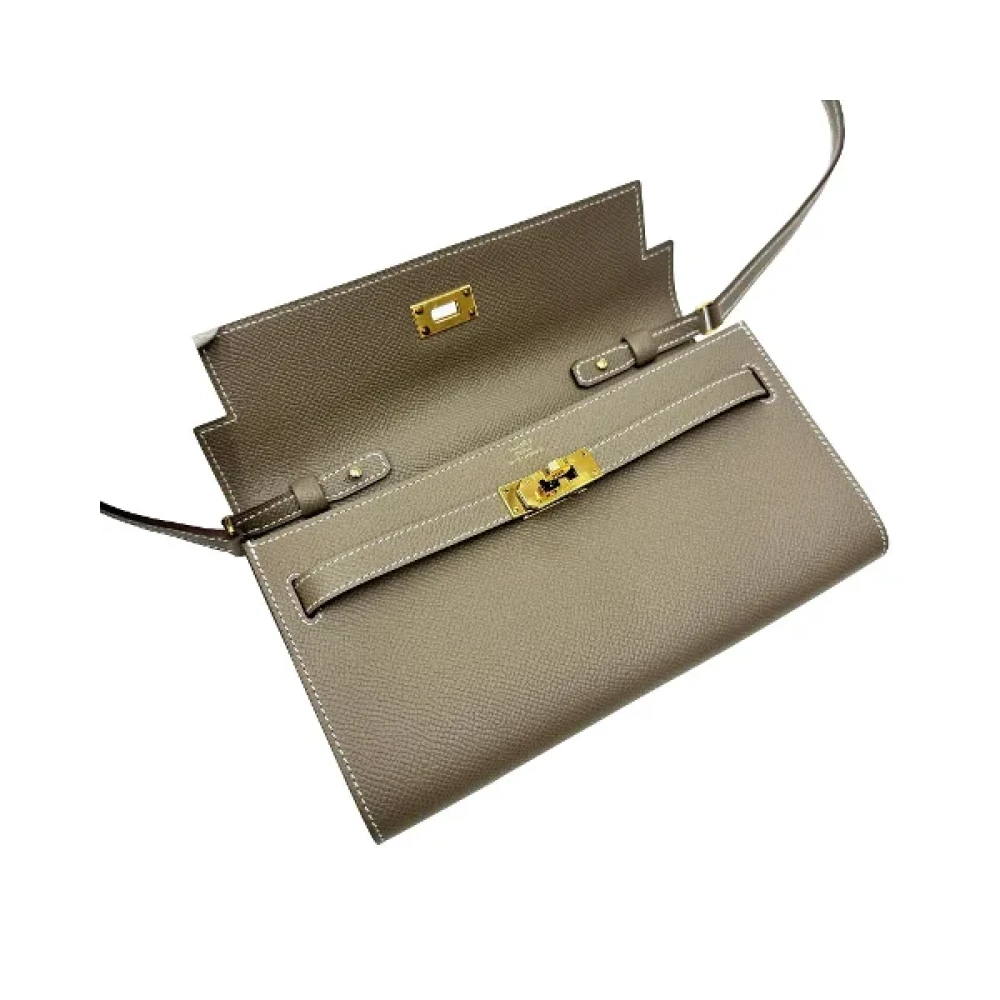 Hermès Vintage Pre-owned Leather clutches Gray Dames
