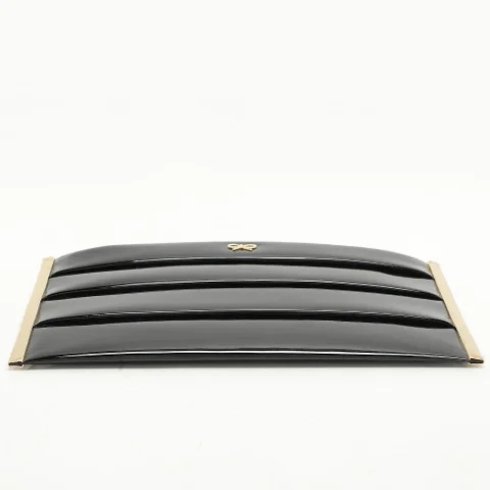 Anya Hindmarch Pre-owned Leather clutches Black Dames
