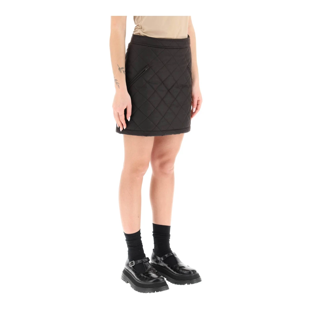Burberry Gewatteerde katoenen mini-rok met tartan voering Black Dames