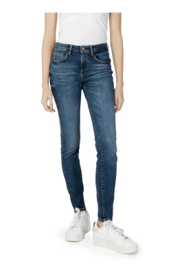 Blå enfärgade damjeans