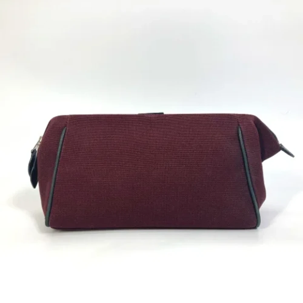 Hermès Vintage Pre-owned Fabric clutches Red Dames