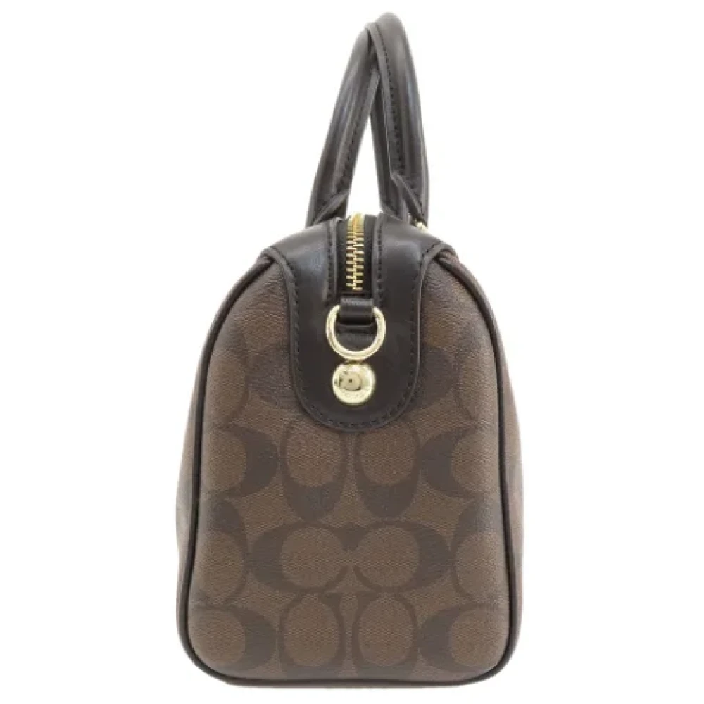 Coach Pre-owned Plastic handbags Brown Dames