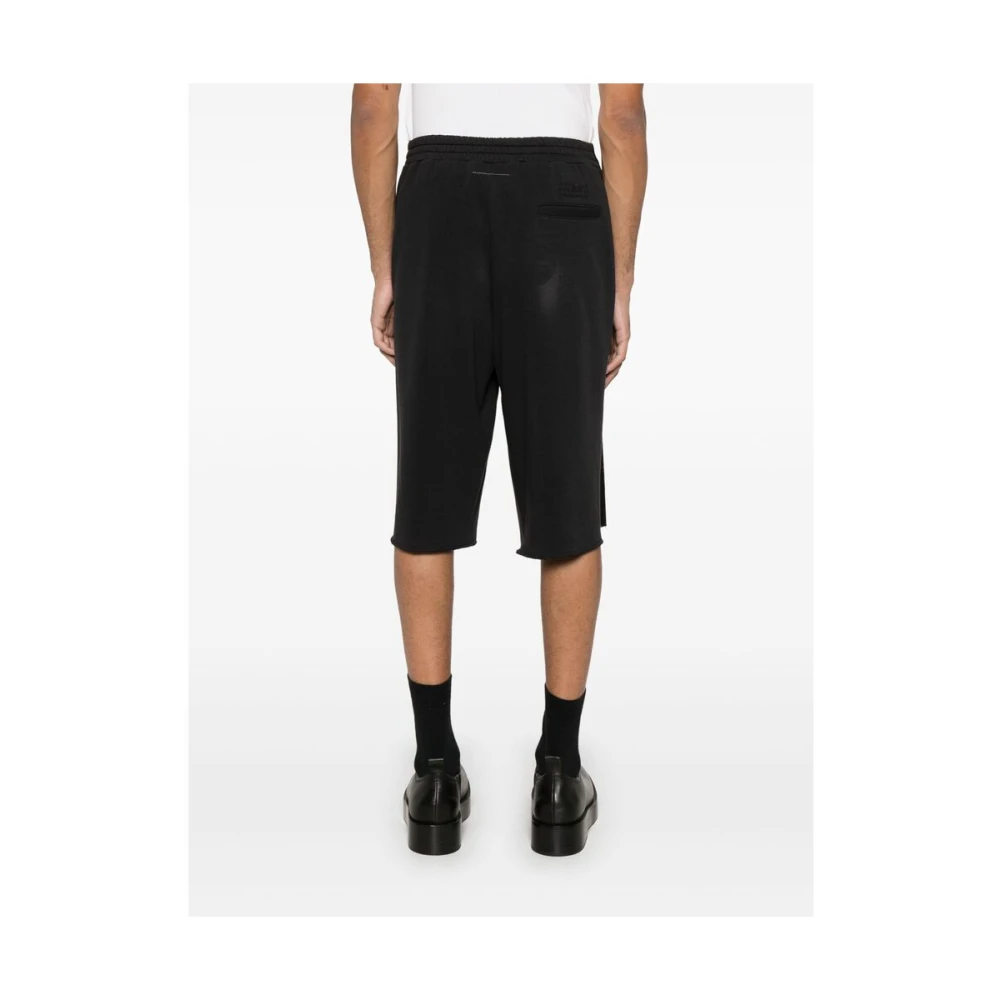 MM6 Maison Margiela Zwarte broek met knoopsluiting aan de voorkant Black Heren