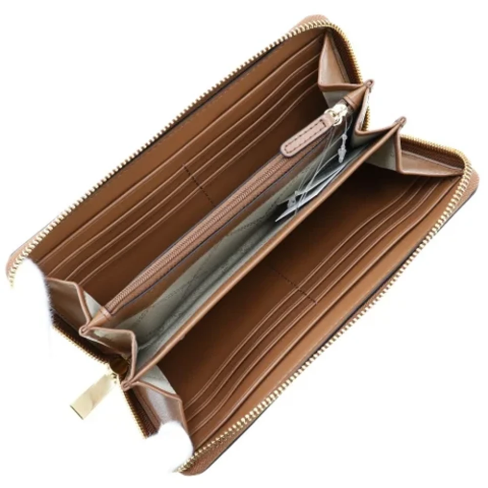 Michael Kors Pre-owned Leather wallets Brown Dames
