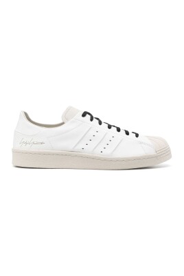 white-sneakers-with-rubber-toecap