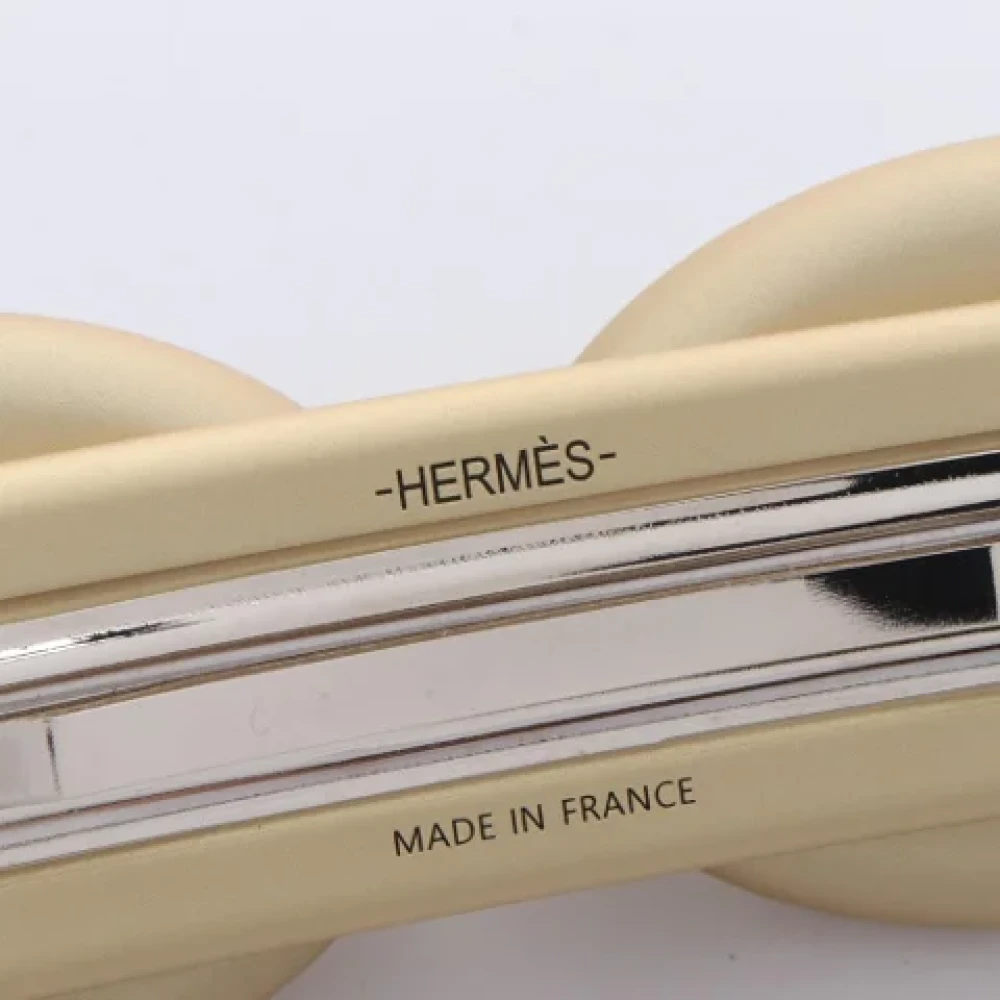 Hermès Vintage Pre-owned Metal hair-accessories Yellow Dames