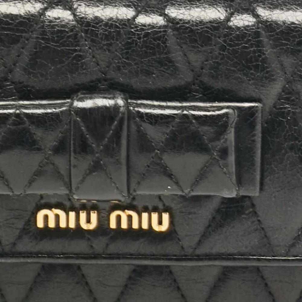 Miu Pre-owned Leather wallets Black Dames