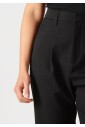 tailor-broek-met-leren-accenten