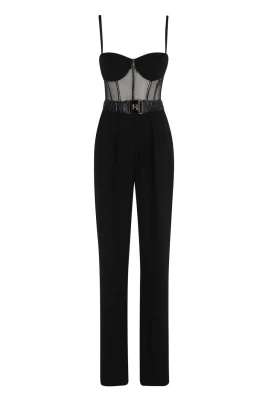 Svart jumpsuit med vinyl detaljer