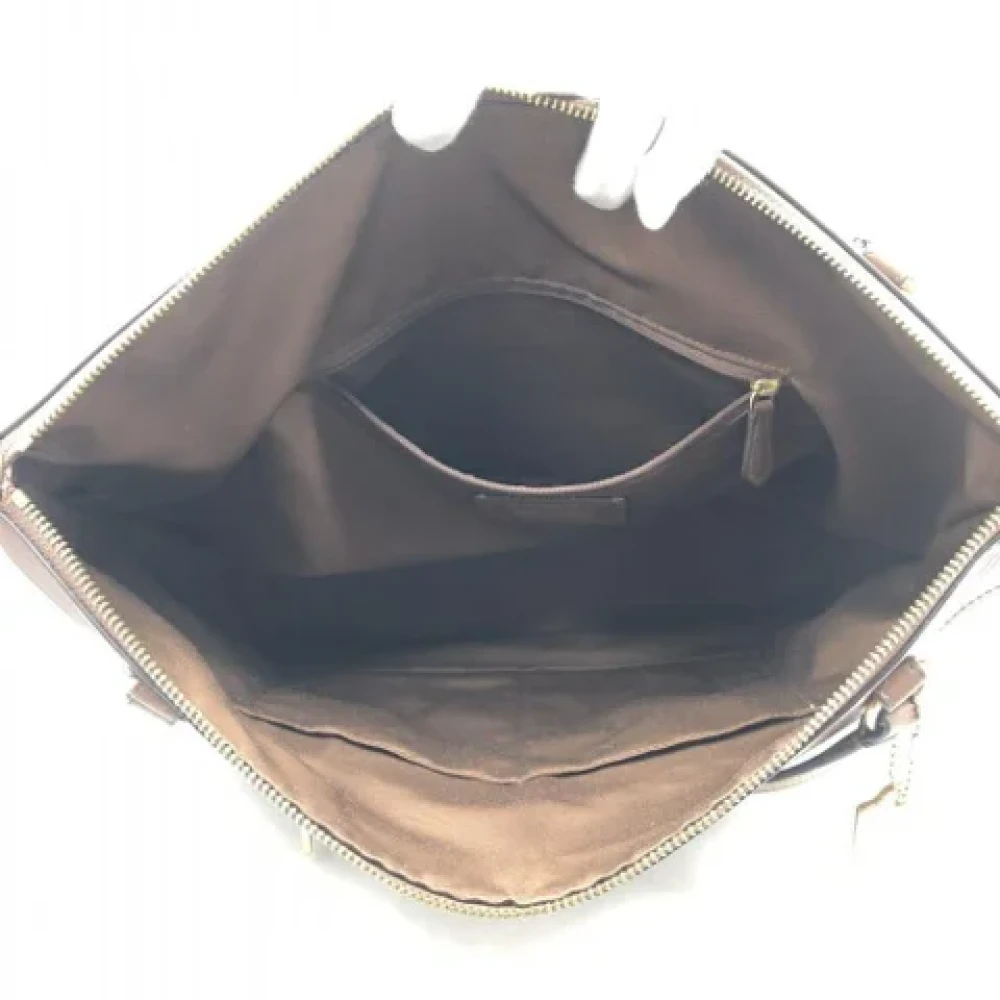 Coach Pre-owned Fabric handbags Brown Dames