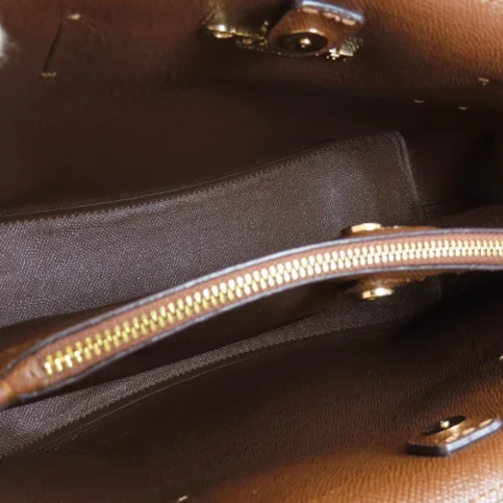 Coach Pre-owned Plastic totes Brown Dames