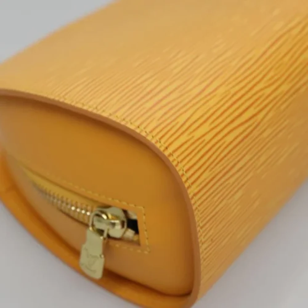 Louis Vuitton Vintage Pre-owned Leather pouches Yellow Dames