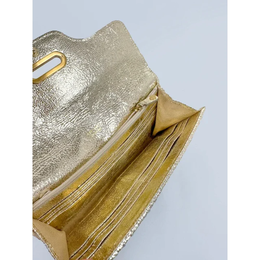 Jimmy Choo Pre-owned Leather clutches Gray Dames