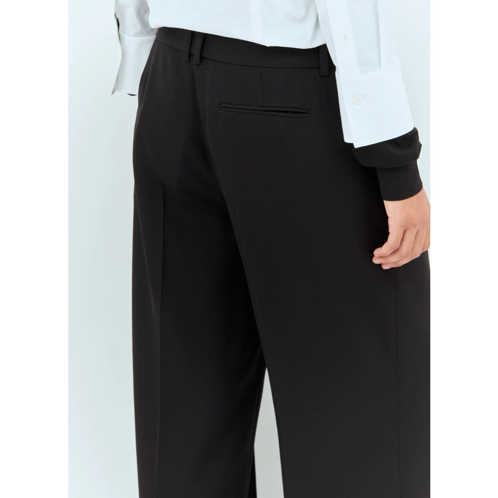 The Row Wollen op maat gemaakte broek met persplooien Black Dames